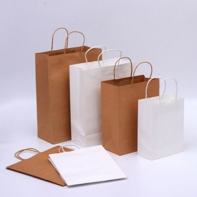 Ambiant les sacs en papier de papier d'emballage de gravure de Brown avec le logo ont imprimé 28* 22cm