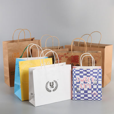 Ambiant les sacs en papier de papier d'emballage de gravure de Brown avec le logo ont imprimé 28* 22cm