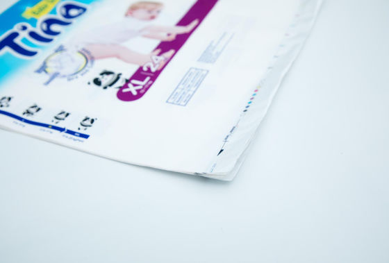 La coutume de serviette hygiénique de couche-culotte de LDPE a imprimé des sachets en plastique empaquetant l'OIN avec la poignée de correction